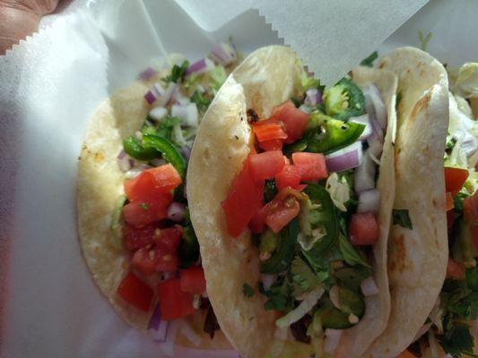 Three carne asada tacos