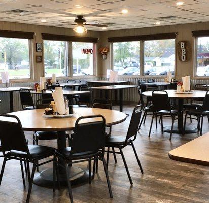 Spacious interior with some tables closed for social distancing.