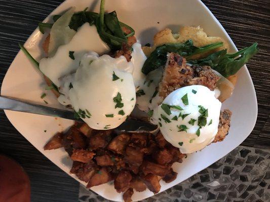 Fried chicken Benedict with potatoes. Flavors are well balanced, fresh and amazing.