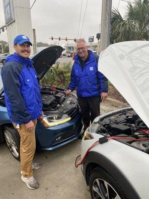 Bart & Eric were the first to get to the girls and helped both change the tire and jump start the car when it wouldn't start!