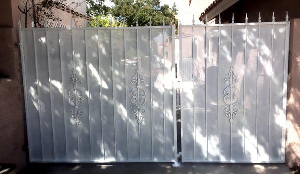 On site repair/modifications. This was a single panel gate turned into panel and gate combination, with a full repaint.