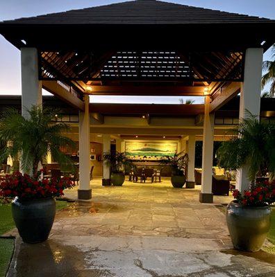 Pool area with grills and seating next to Ocean Gem.