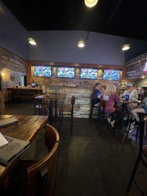 The bar and some of the TVs.