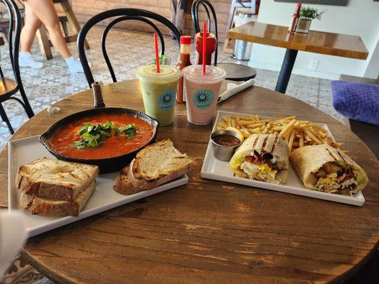 Shakshuka and a breakfast burrito for brunch.  With a matcha iced latte and a banana and strawberry ice blended drink