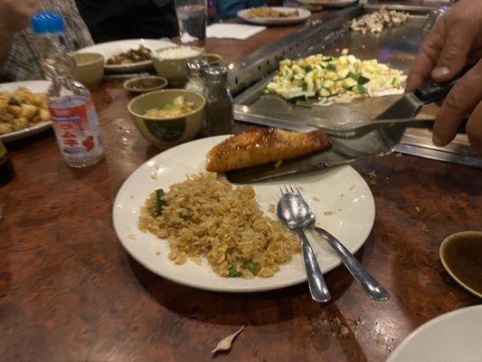 Salmon and fried rice, served fireside.