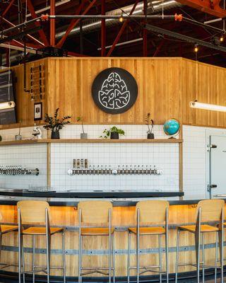 Discover the Aurora Arts taproom at Cerebral Brewing, where community and craft beer come together in a lively, artistic space!