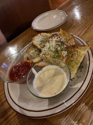 Garlic bread with marinara and a Gorgonzola cream sauce