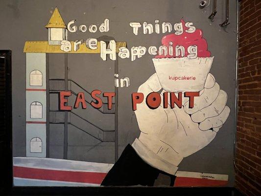 Wall art in the rear room: Good Things are Happening in East Point.