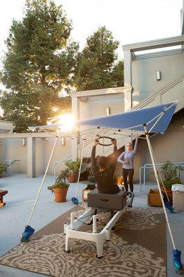 Outdoor Privates on the Pilates reformer in our private patio