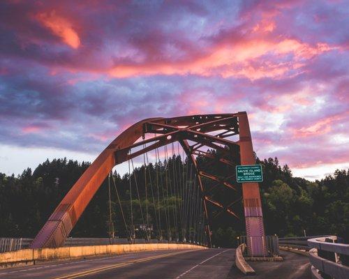 The Sauvie Island Bridge at Sunset. Learn to take and edit photos like this.