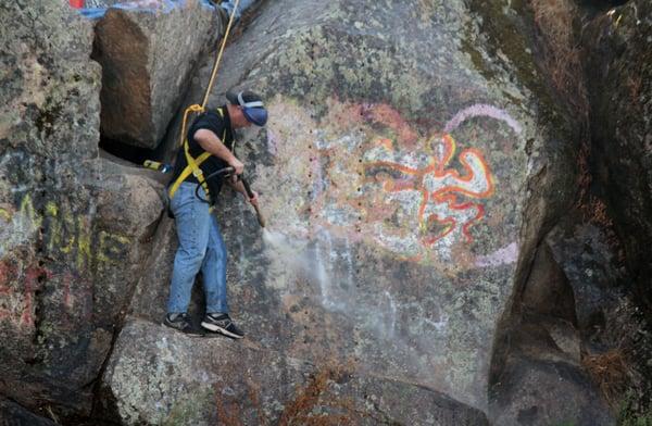 Graffiti removal: Wet sand blasting to remove the toughest graffiti.