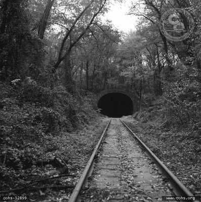 A photo from the C&O archives shows the Eastern entrance to the tunnel. Around where E Grace St. and N 30th St meet.