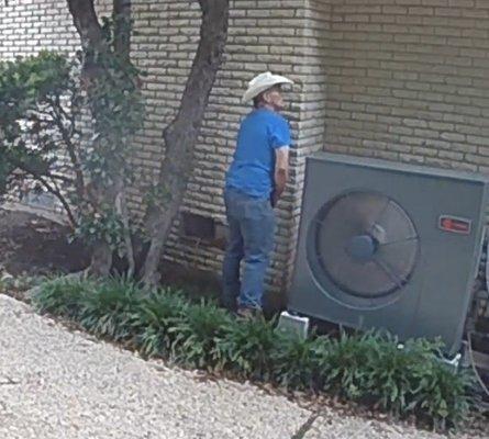 Service Technician urinating on the side of my AC. (He could have just asked to use my bathroom.)