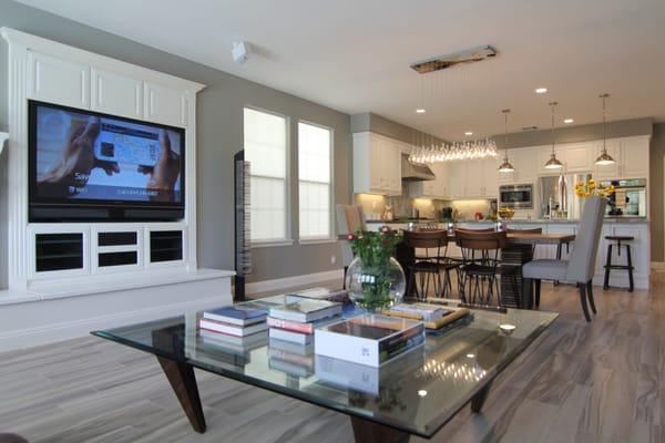 Great room install of wood - like porcelain tiles, countertops & backsplash by Greg and his team at Marty's Flooring America.