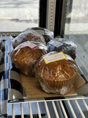 Bakery items in the front case assorted muffins