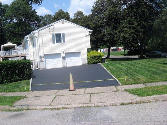 Driveway Sealcoating Seal of Approval Sealcoating