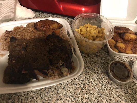 Jerk Chicken, size small with a side of plantains and Mac n cheese and side of jerk sauce for rice