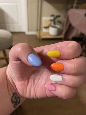 Multi colored nails with a smooth almond shape