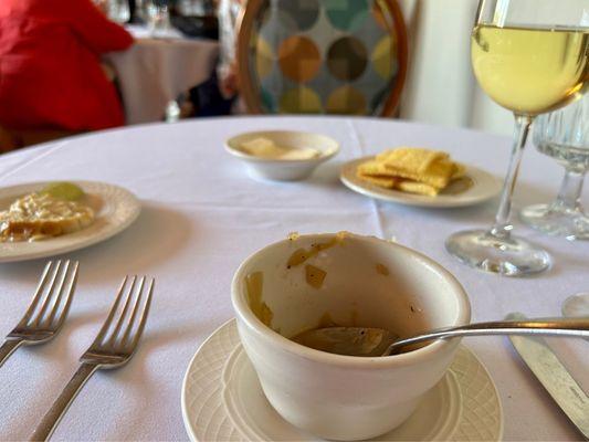 Remnants of the onion soup. I toasted, broth soaked bread on the side