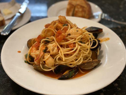 Tutto Mare (Spaghetti in a red sauce with mussels, clams, shrimp and fish)