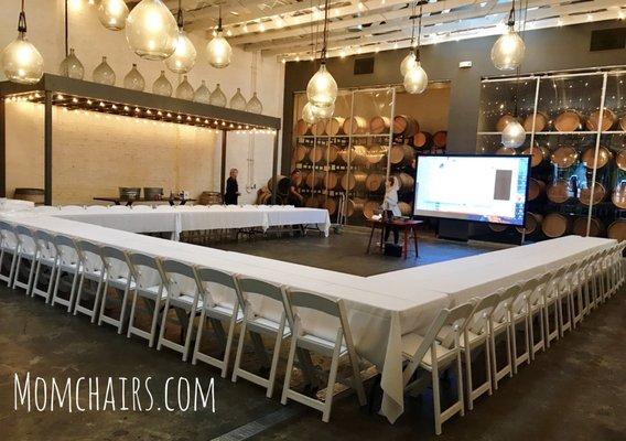 Setup by Mom Chairs at a local SF brewery! Pictured: White resin folding chairs, 8ft rectangular table, 10' banquet linens