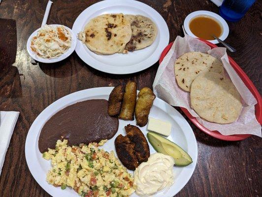 Traditional breakfast plate and two pupusas