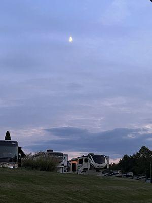 Moon with campers (view from a fire ring)