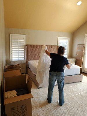 Movers Packing up Bedroom