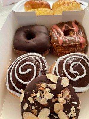 Cake donut, Boston Cream donut, Chocolate cronut, Dulce de Leche cronut, and kolaches.