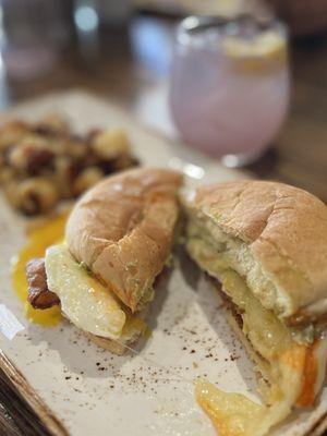 Elevated egg sandwich with a spiked lavender lemonade