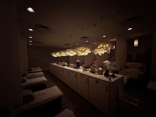 Foot massage area, dark and relaxing.