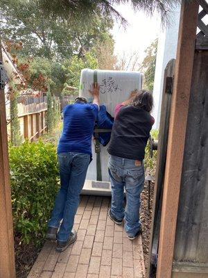 Moving the hot tub down our hill