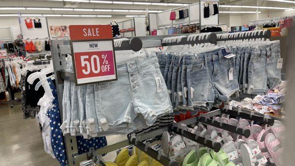 Bought Jean shorts from each section. Price would be $13 instead of $27. Sign is very visible to walk herself and see