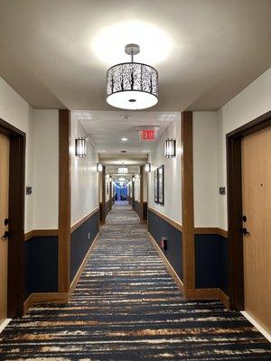 Hallway looking down to small sitting area