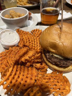 Burgers, fries, beer, and cheese curds