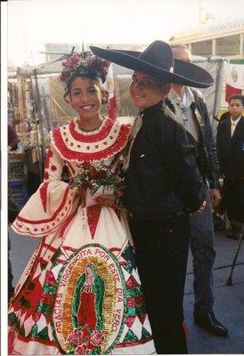 Every stitch of tread and piece of embroidery on this stunning quinceañera dress was hand sewn by our seamstress, Maria Azucena.