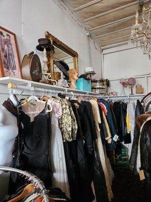 A sampling photo of hundreds of wonderful vintage clothing pieces for your tastes!