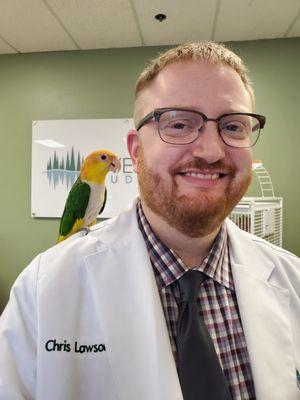 Dr. Chris Lawson, owner and operator of Evergreen Audiology Clinic (right) and Tragus (left)