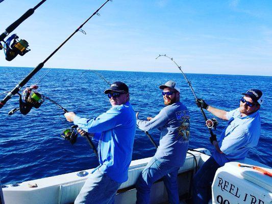 Family picture! All catching fish at the same time!