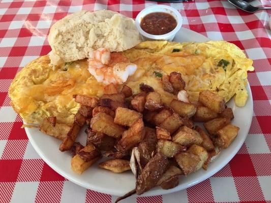 Shrimp Omelette with home made biscuits and potatoes.