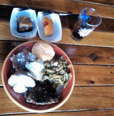 What you see - the steak special dinner platter, TWO types of free cake slices that the owner does for the customers, and a soft drink.