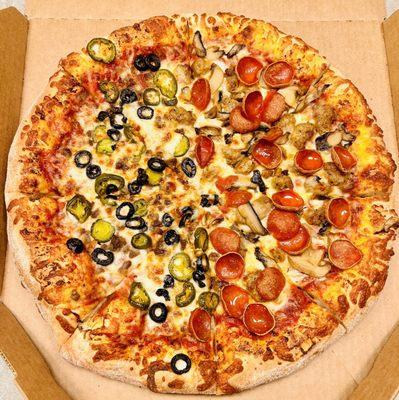 Create Your Own: ground beef, black olives and jalapeños on one half; pepperoni, sausage and mushrooms on the other