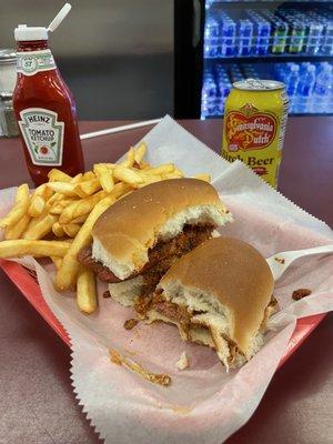 Dogs with sauce and mustard with fries.