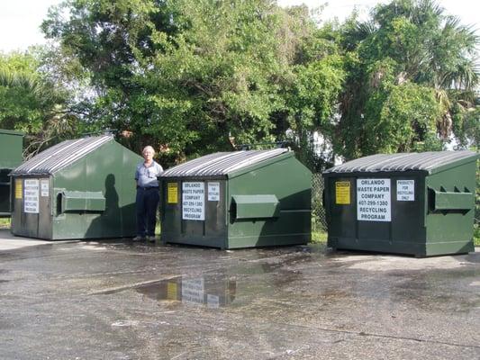 from left to right - 8 cubic yard, 6 cubic yard, 4 cubic yard front load container