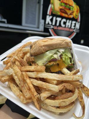 La asunción burger 12oz ground beef 80/20 seasoning to perfection deep fried jalapeño and queso sauce with LTO and freshly cut French fries