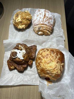 Monkey bread muffin, pumpkin spice muffin, chocolate croissant, ham and cheese croissant