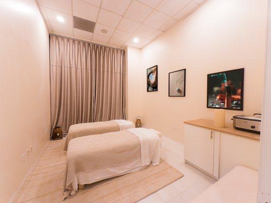 Experience the ultimate bonding experience with your loved one in our cozy couple massage room, where two therapists will cater to your ever