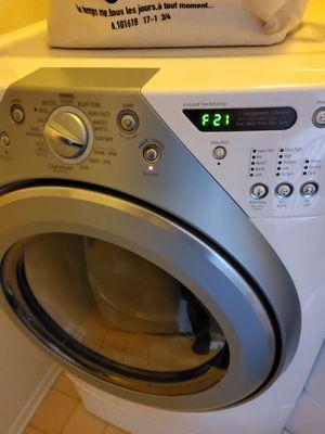 Successful Whirlpool washing machine repair with F21 error code issue.