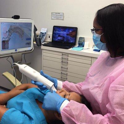 using our new iTero element 3D digital scanner that creates accurate digital images of the teeth, no more impressions!