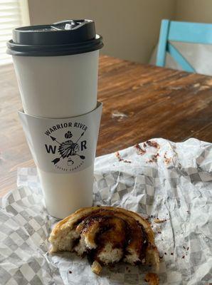 Large caramel latte and cinnamon roll